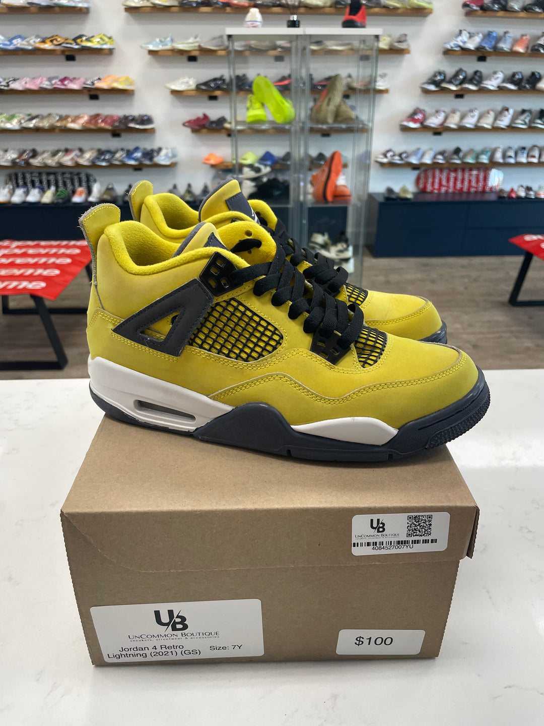 Jordan 4 Retro Lightning (2021) (GS)- Worn