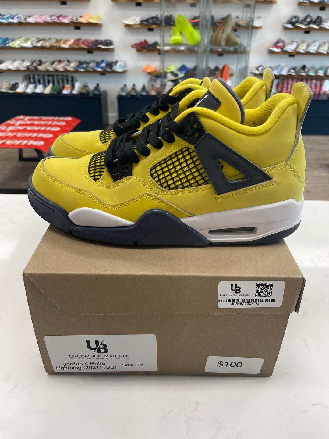 Jordan 4 Retro Lightning (2021) (GS)- Worn