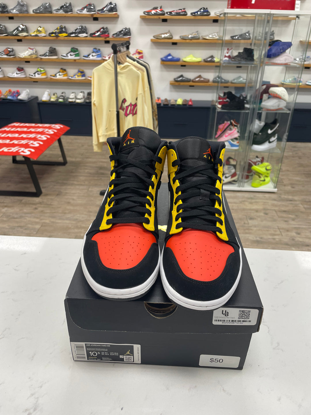Jordan 1 Mid Black Amarillo Orange - Worn