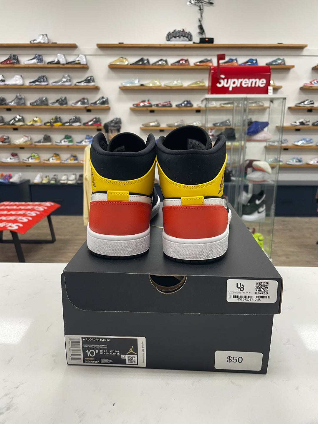 Jordan 1 Mid Black Amarillo Orange - Worn