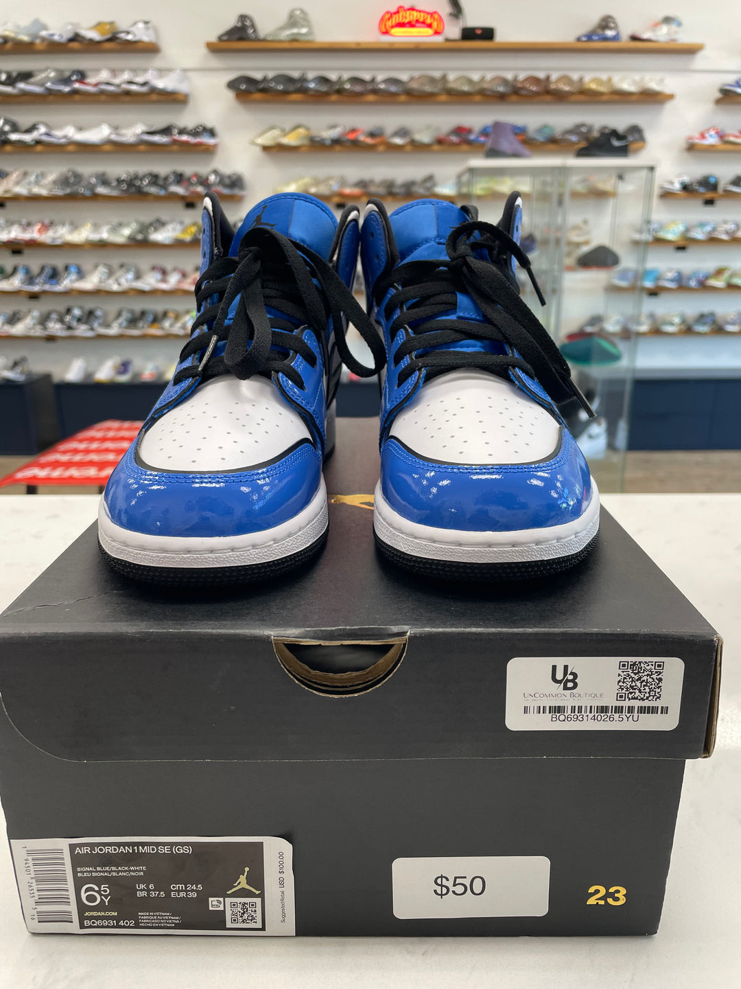 Jordan 1 Mid Signal Blue (GS) - Worn