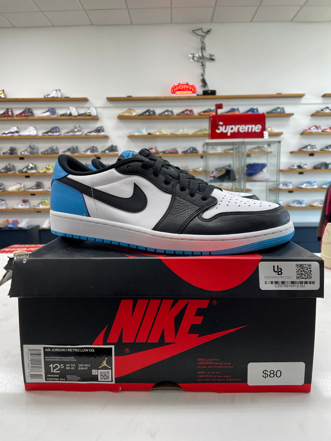 Jordan 1 Retro Low OG Black Dark Powder Blue - Worn